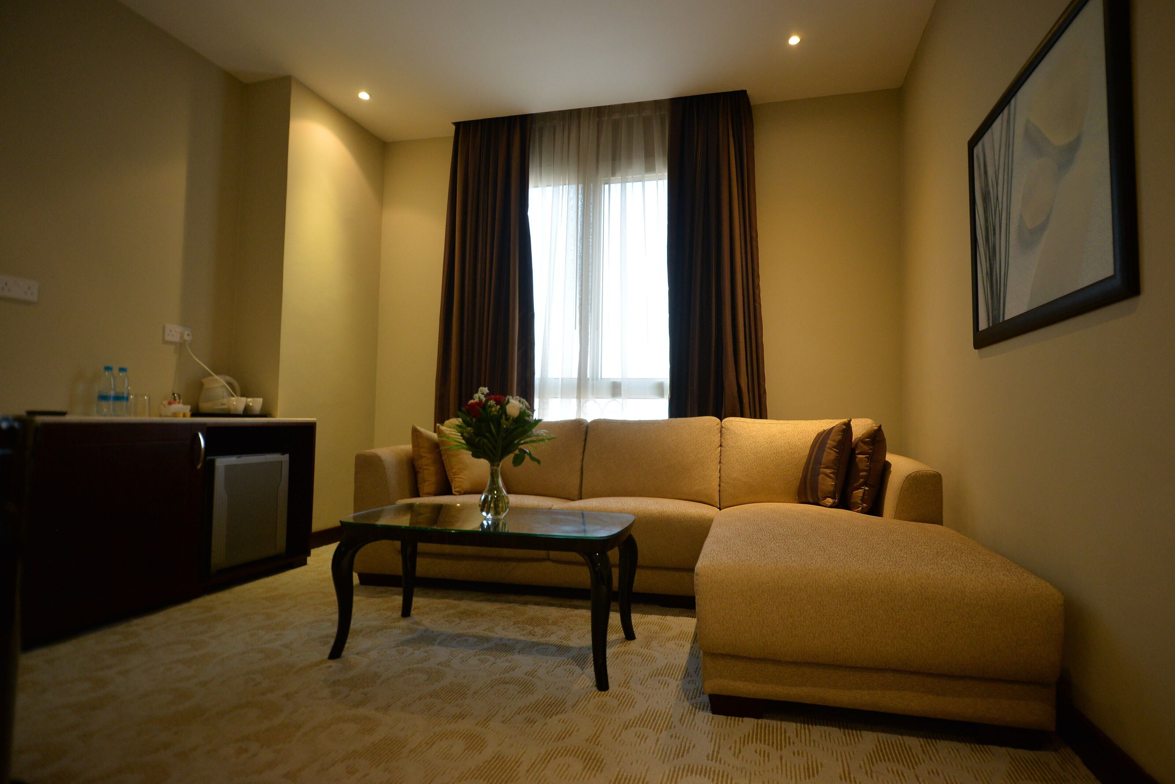 executive suite | living area | flat-screen tv