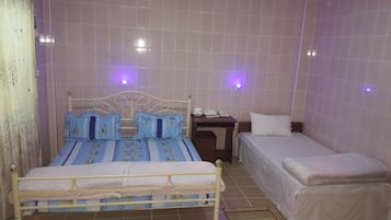 Triple Room | Minibar, in-room safe, desk, free WiFi
