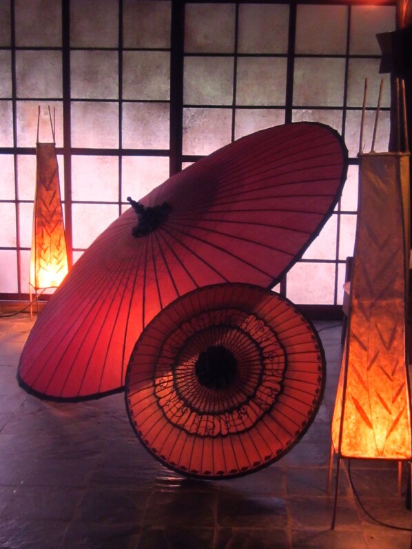 A room with a large, red, circular object in the center, possibly a decorative piece or furniture. - Inle Lake View Resort & Spa (Nyaungshwe)