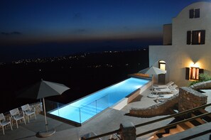 Outdoor pool, open 9:00 AM to 8:30 PM, pool umbrellas, pool loungers