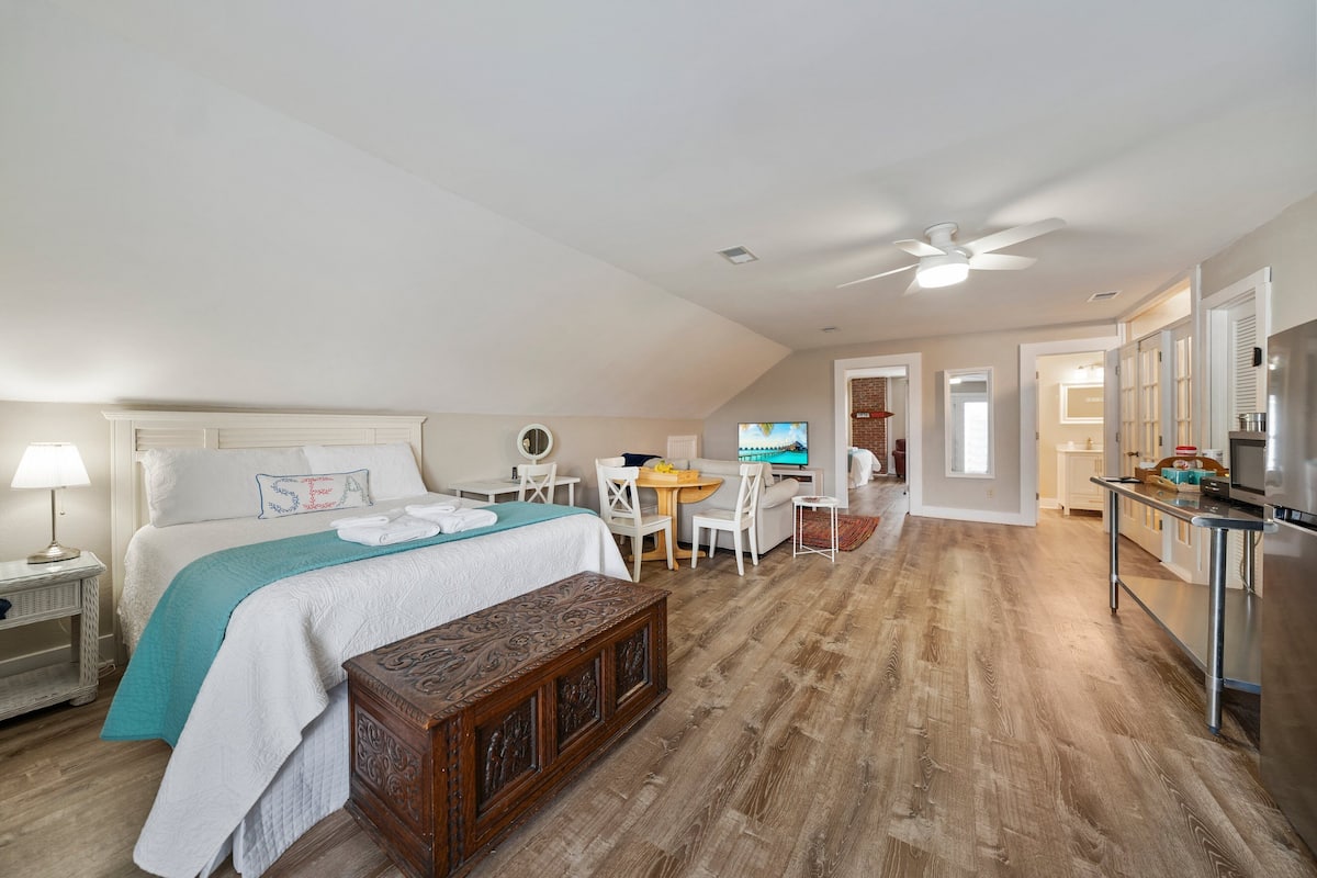 Suite, Multiple Beds | 1 bedroom, laptop workspace, iron/ironing board, free WiFi