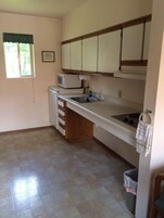 Room, 2 Queen Beds, Non Smoking, Kitchenette | Private kitchenette | Mini-fridge, microwave, freezer