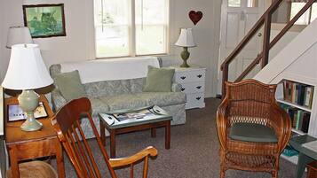 Cottage, 3 Bedrooms | Living area | 32-inch TV with cable channels