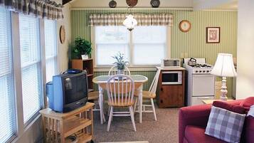 Cottage, 1 Bedroom | Living area | 32-inch TV with cable channels