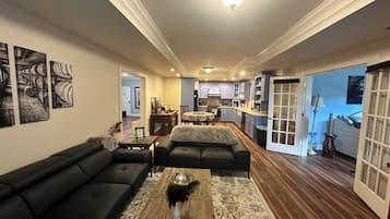 Family Apartment, Multiple Beds, Kitchenette, Garden View | Living area | 42-inch flat-screen TV with digital channels, TV, Netflix