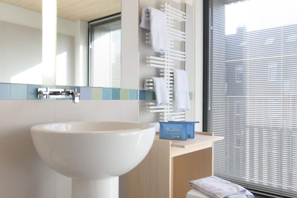 suite | bathroom | free toiletries, hair dryer, slippers, towels