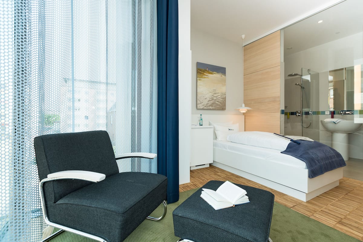 junior suite, refrigerator | in-room safe, desk, iron/ironing board, rollaway beds