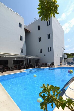 Outdoor pool, pool umbrellas, pool loungers