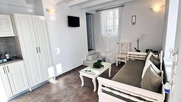Deluxe appartement | Woonruimte | Een plasmatelevisie