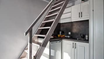 Appartement Deluxe | Coin cuisine privé | Réfrigérateur, plaque de cuisson