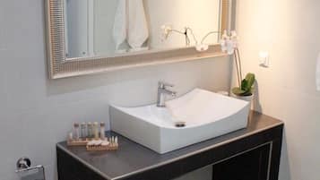 Shower, free toiletries, hair dryer, slippers