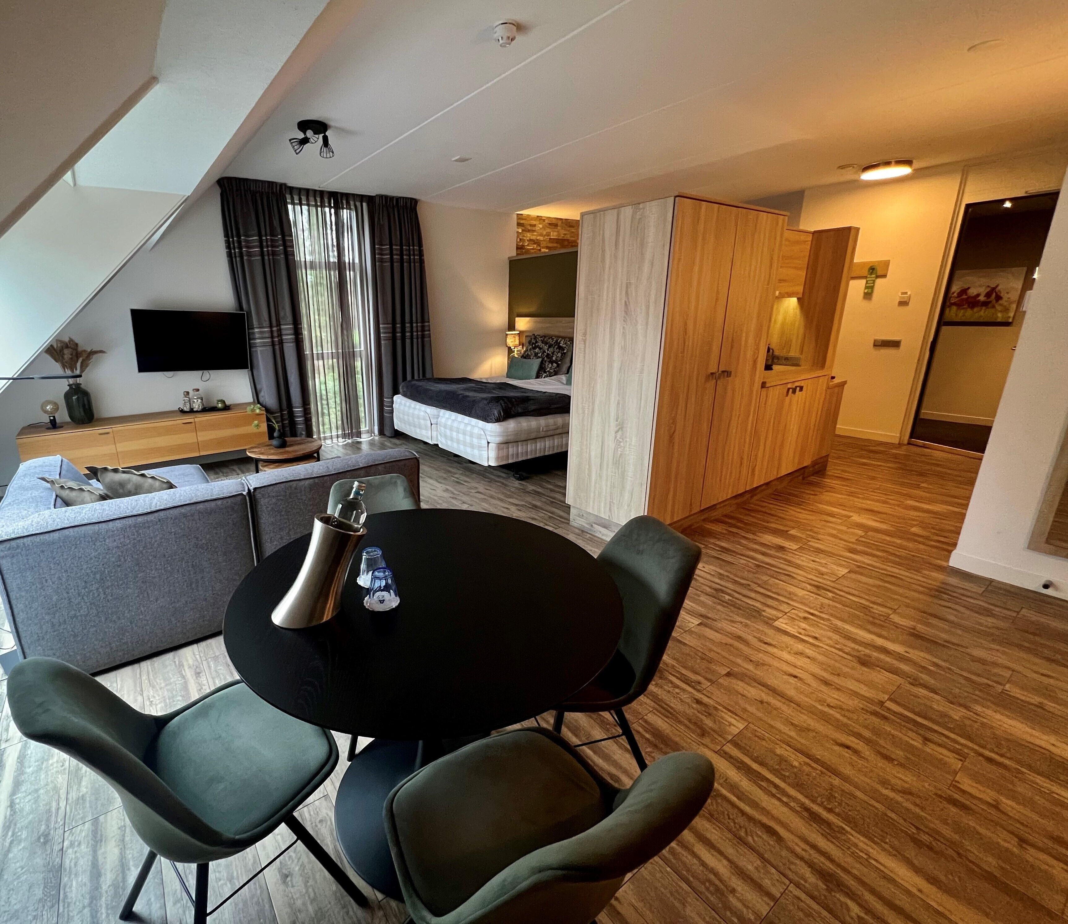 Honeymoon Suite | Premium bedding, in-room safe, desk, laptop workspace