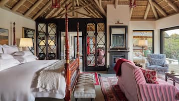 Suite de lujo (Malewane Lodge) | Ropa de cama de alta calidad y artículos del minibar gratis