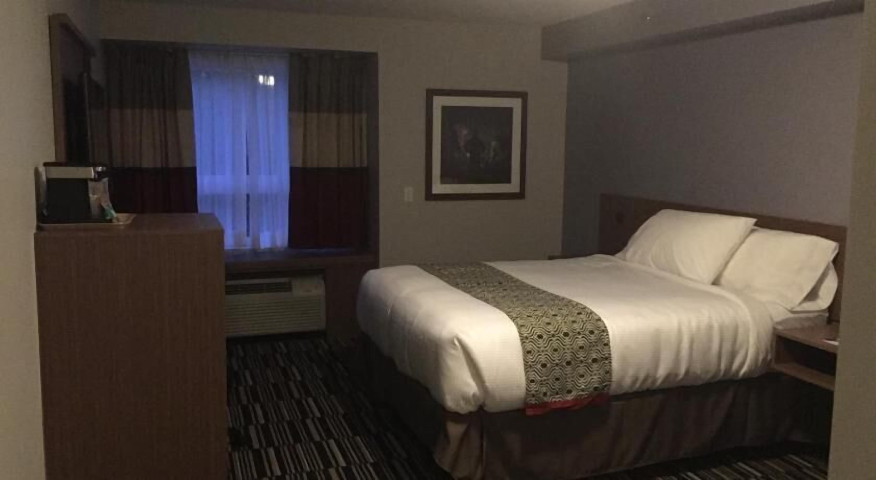 Pillowtop beds, desk, blackout drapes, iron/ironing board
