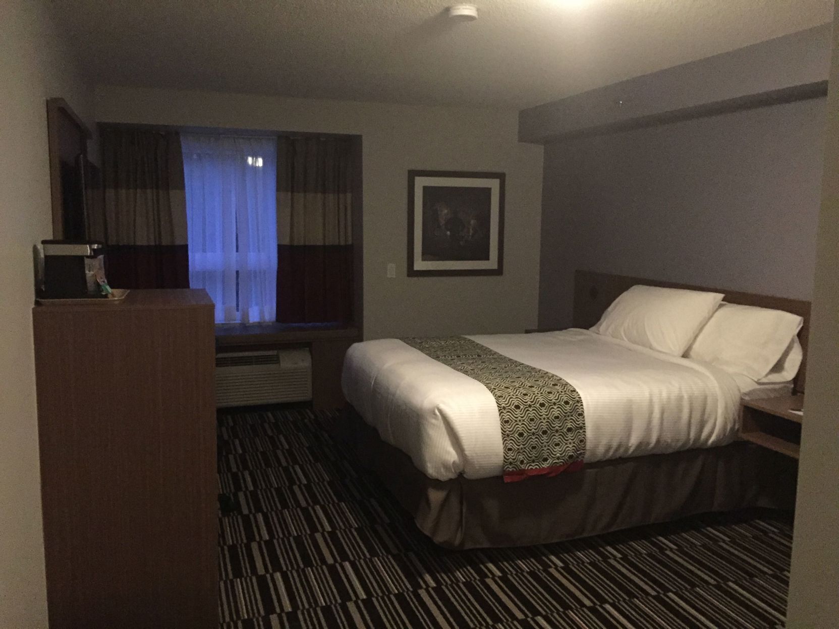 Pillowtop beds, desk, blackout drapes, iron/ironing board