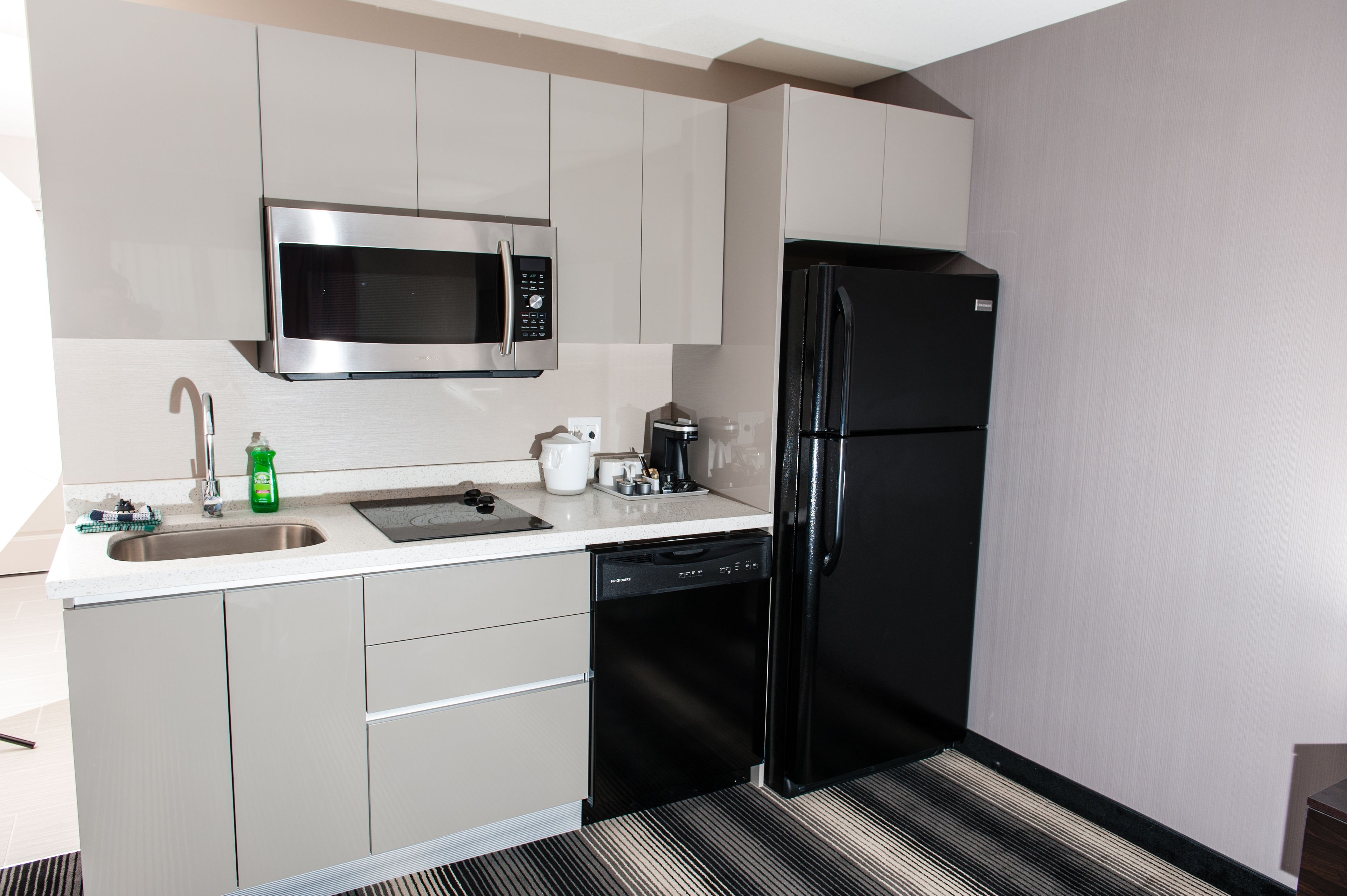 suite, 1 king bed, accessible | private kitchenette | full-sized fridge, microwave, stovetop, dishwasher