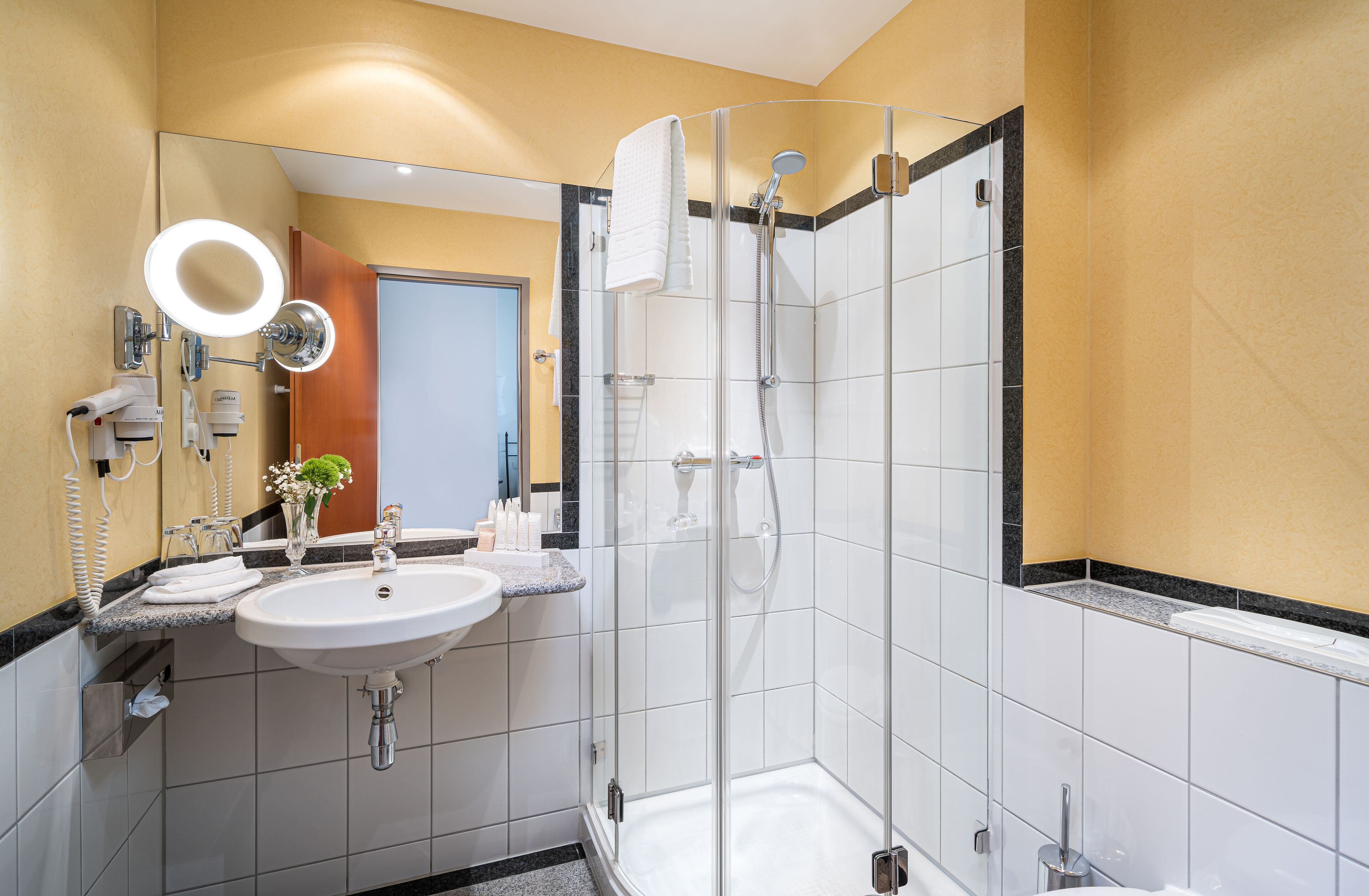 deep-soaking bathtub, free toiletries, hair dryer, towels