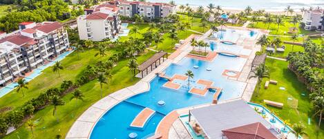 Outdoor pool, open 9 AM to 9 PM, free cabanas, pool umbrellas