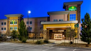 A hotel with a modern design, featuring a prominent sign for LaQuinta Inn & Suites. - La Quinta Inn & Suites by Wyndham Monahans (Monahans)