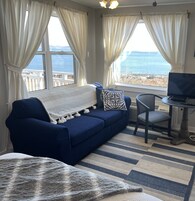 1 habitación, sistema de insonorización y tabla de planchar con plancha 