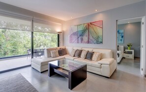 Appart'hôtel Deluxe, 2 chambres, balcon, vue golf (Hole In One Condo) | Coin séjour