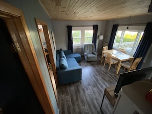 Cottage #3 Premium Cottage, 2 bedrooms | Living area | 32-inch flat-screen TV with cable channels, TV
