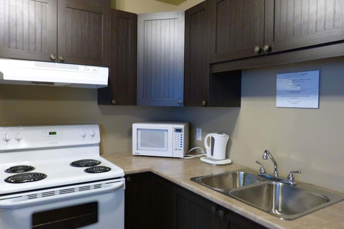 superior quadruple room, 2 queen beds, terrace, lakeside | private kitchen | coffee/tea maker