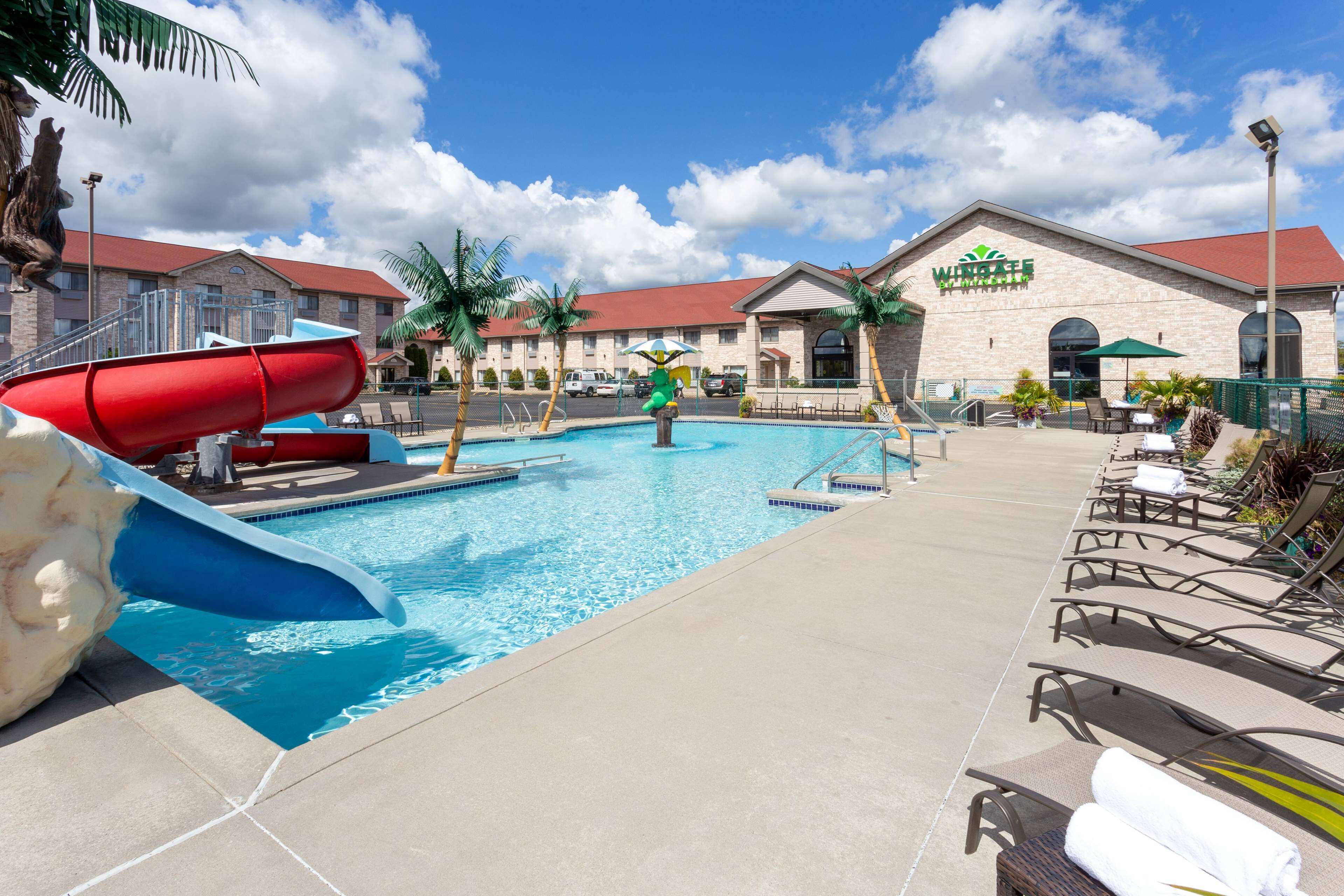 Indoor pool, seasonal outdoor pool, pool umbrellas, pool loungers