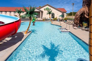 Indoor pool, seasonal outdoor pool, pool umbrellas, sun loungers