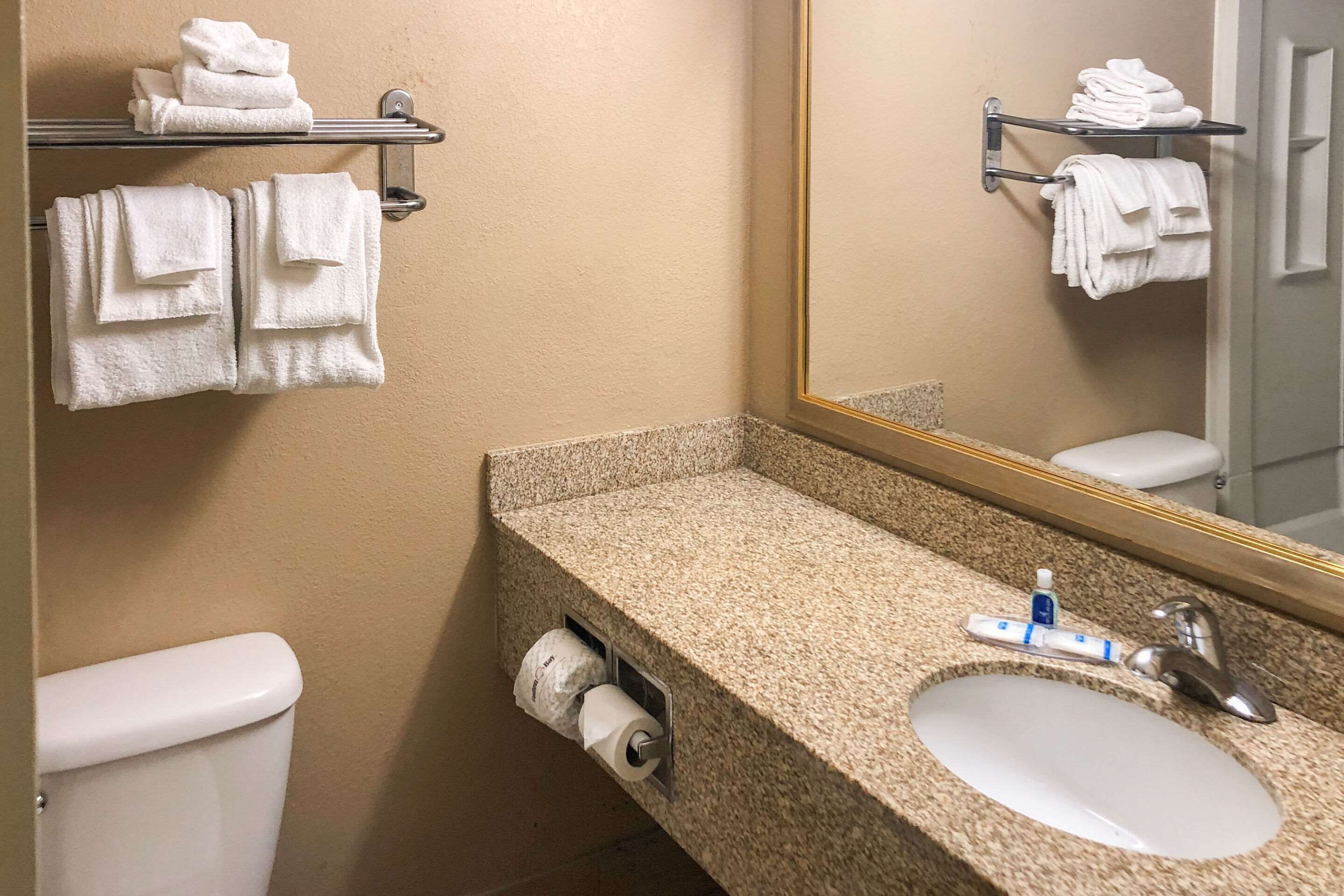 Combined shower/tub, hair dryer, towels, soap
