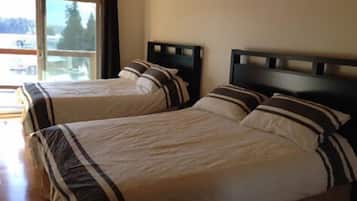 Room, 2 Queen Beds | Free rollaway beds, free WiFi, bed sheets