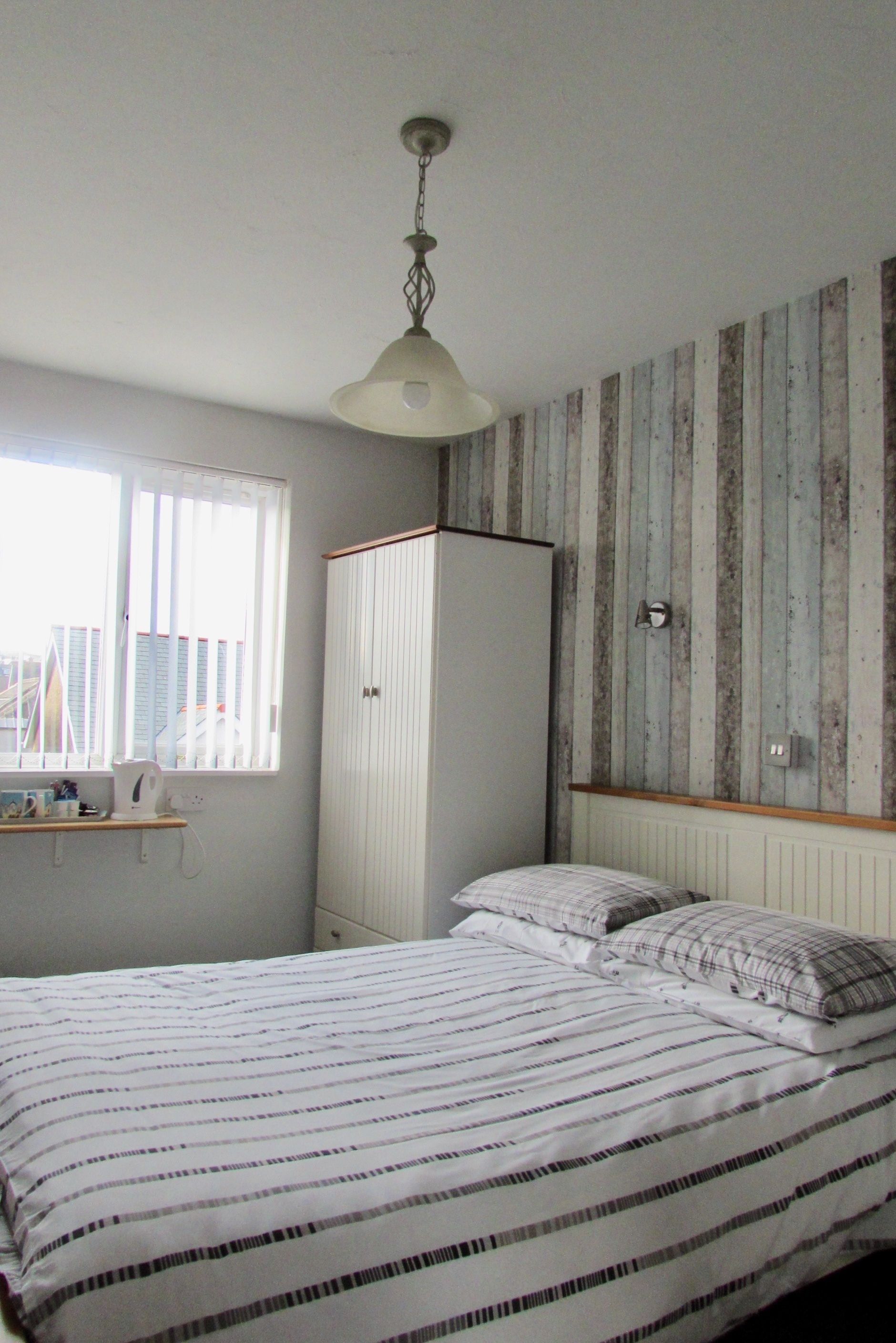 Economy Double Room, Private Bathroom (External Bathroom) | 7 bedrooms, free WiFi, bed sheets