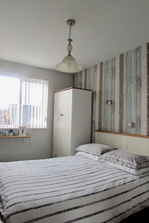 Economy Double Room, Private Bathroom (External Bathroom) | 7 bedrooms, free WiFi, bed sheets