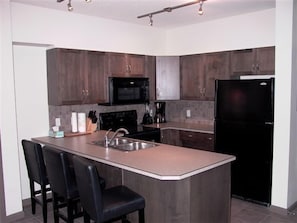 Condo, 2 Bedrooms (#659) | Private kitchen | Full-sized fridge, microwave, dishwasher, cookware/dishes/utensils - Okanagan Valley Rentals at Playa Del Sol (Kelowna)