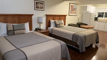 Family Room, 2 Queen Beds | Private kitchen | Fridge, microwave, oven, stovetop