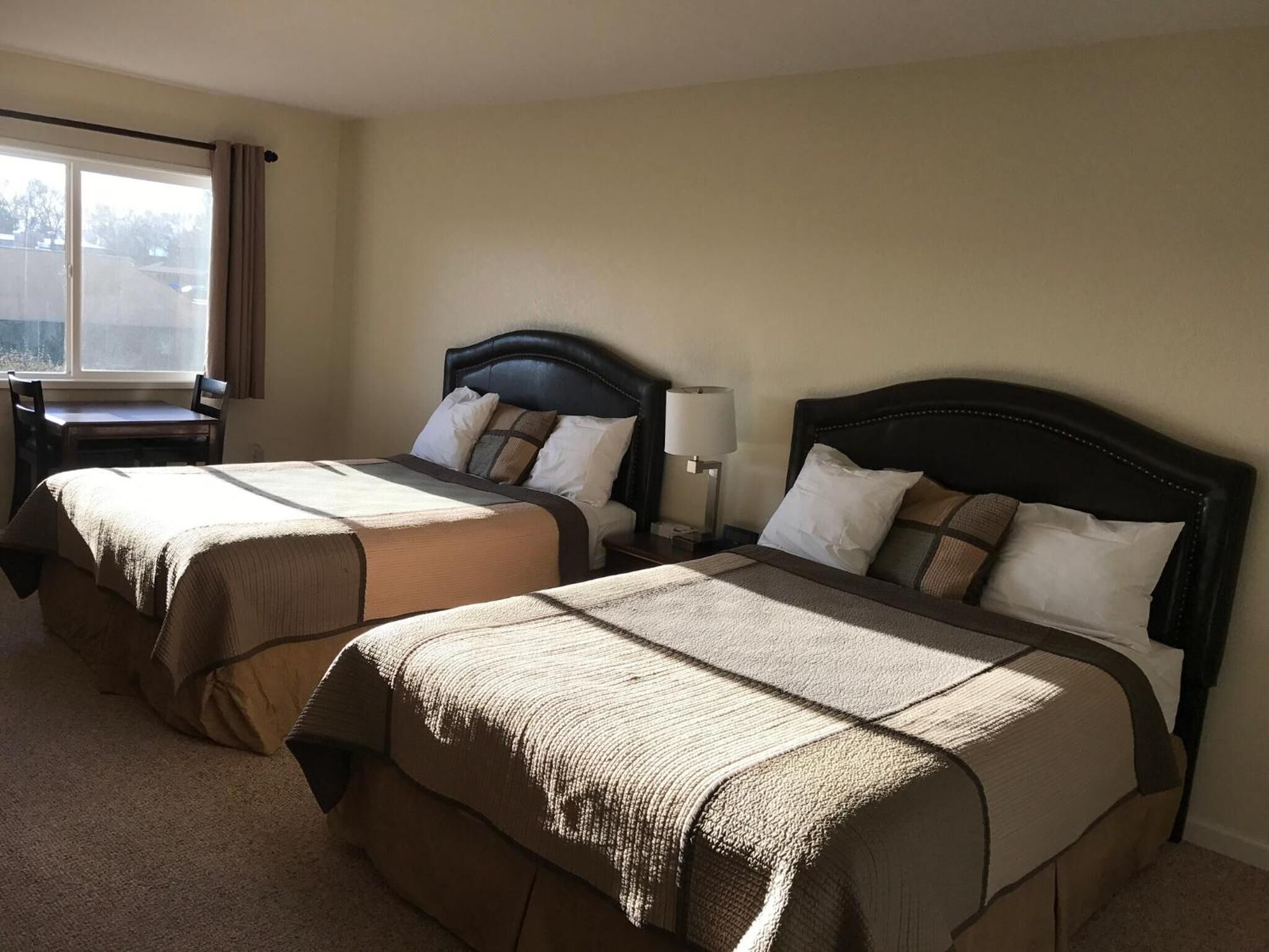 Premium bedding, blackout curtains, soundproofing, iron/ironing board