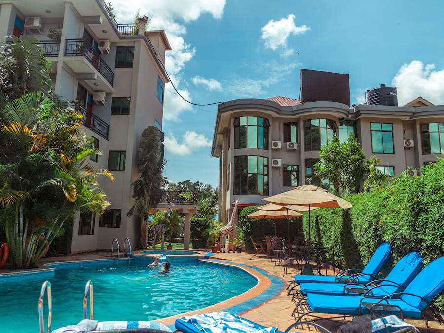 Outdoor pool, open 6:00 AM to 7:00 PM, pool umbrellas