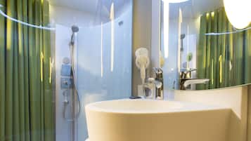 Shower, free toiletries, hair dryer, towels