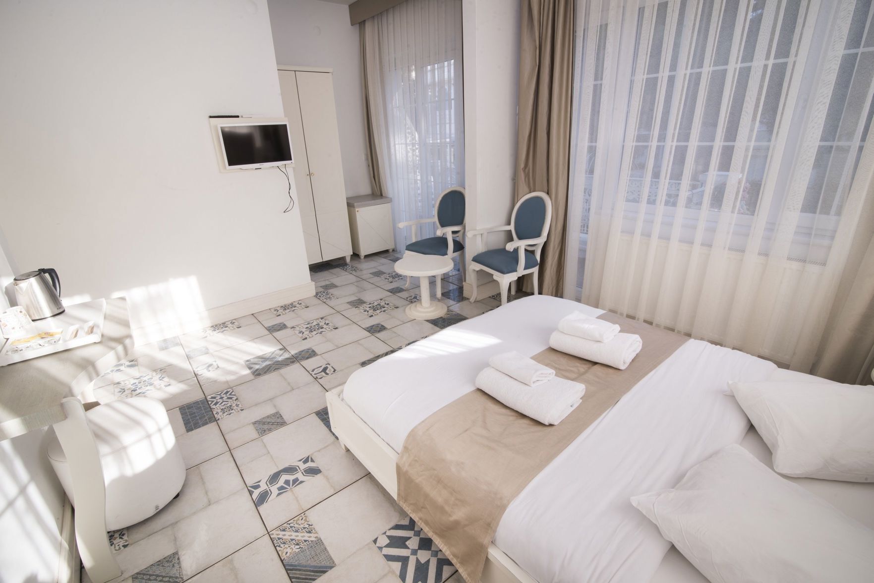 Minibar, schallisolierte Zimmer, kostenloses WLAN, Bettwäsche