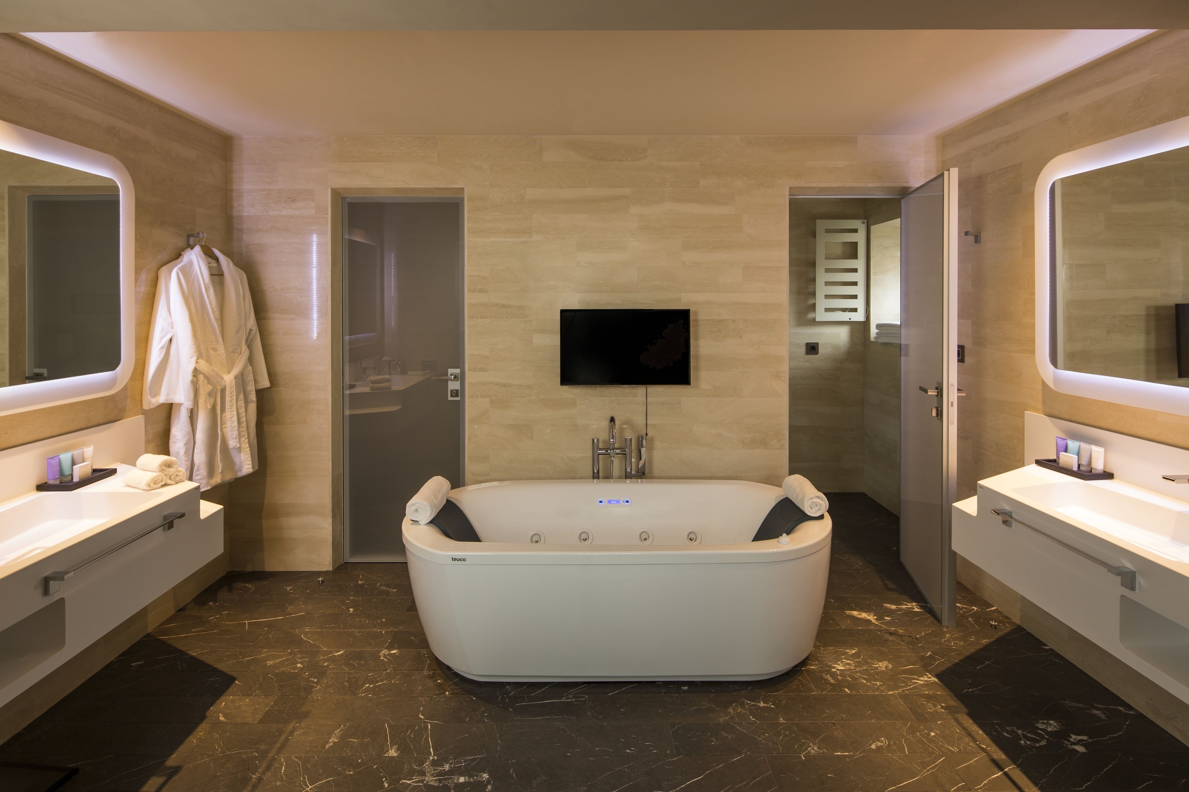 suite (signature) | bathroom | deep-soaking bathtub, designer toiletries, hair dryer, bathrobes