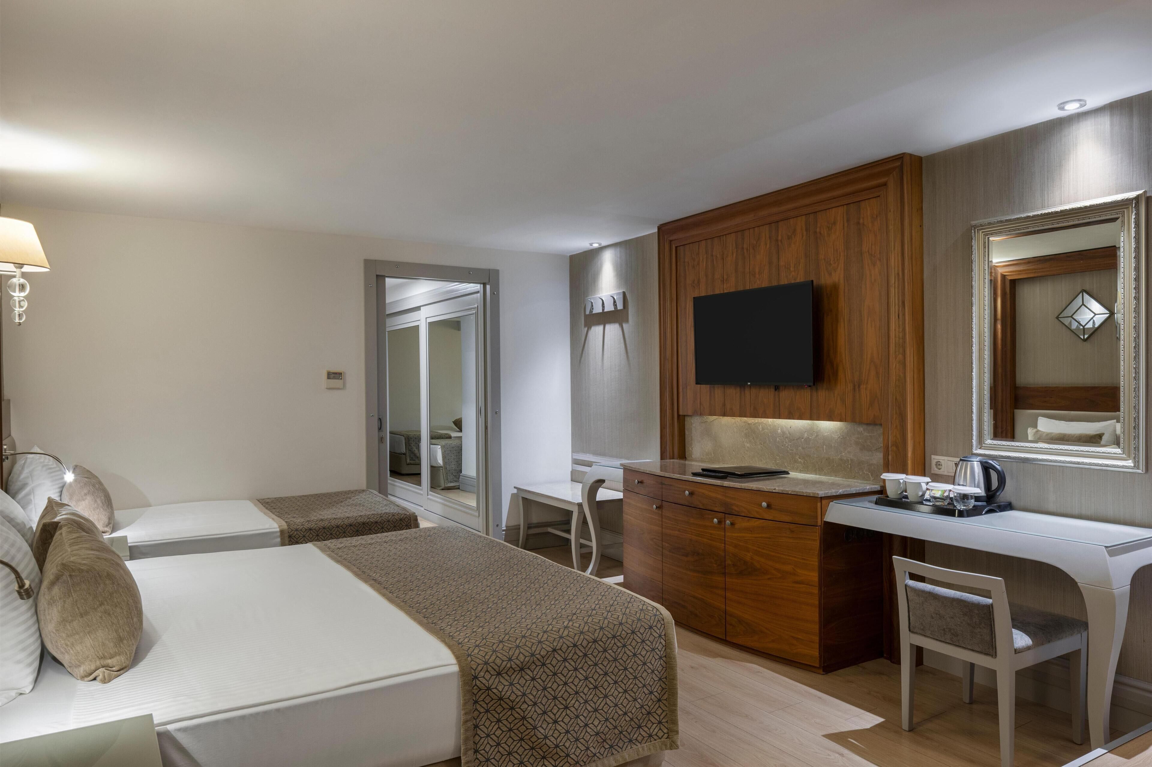 Family Room, 2 Bedrooms, Jetted Tub, Sea View | Free minibar, in-room safe, desk, free WiFi