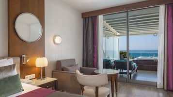 Deluxe Room, Jetted Tub, Partial Sea View | Minibar, in-room safe, desk, soundproofing