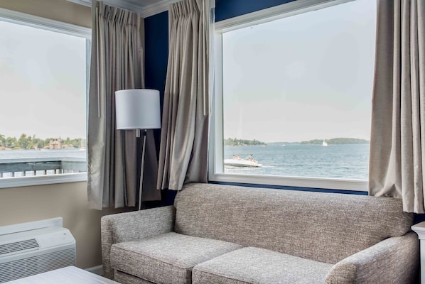 King Riverfront Corner Castleview in Main Channel | Premium bedding, down comforters, pillowtop beds, blackout drapes