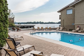 Outdoor pool, open 9:00 AM to 9:00 PM, pool loungers