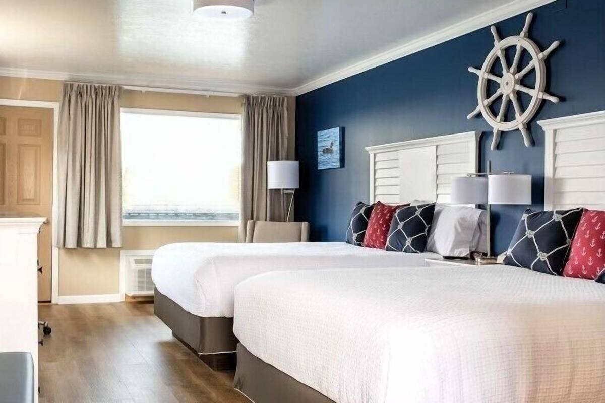 Premium bedding, pillow-top beds, blackout curtains, iron/ironing board