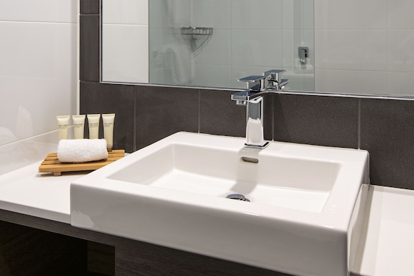 Shower, eco-friendly toiletries, hair dryer, towels
