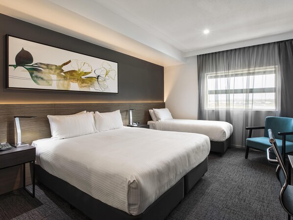 Standard Room, Multiple Beds | Premium bedding, in-room safe, desk, laptop workspace