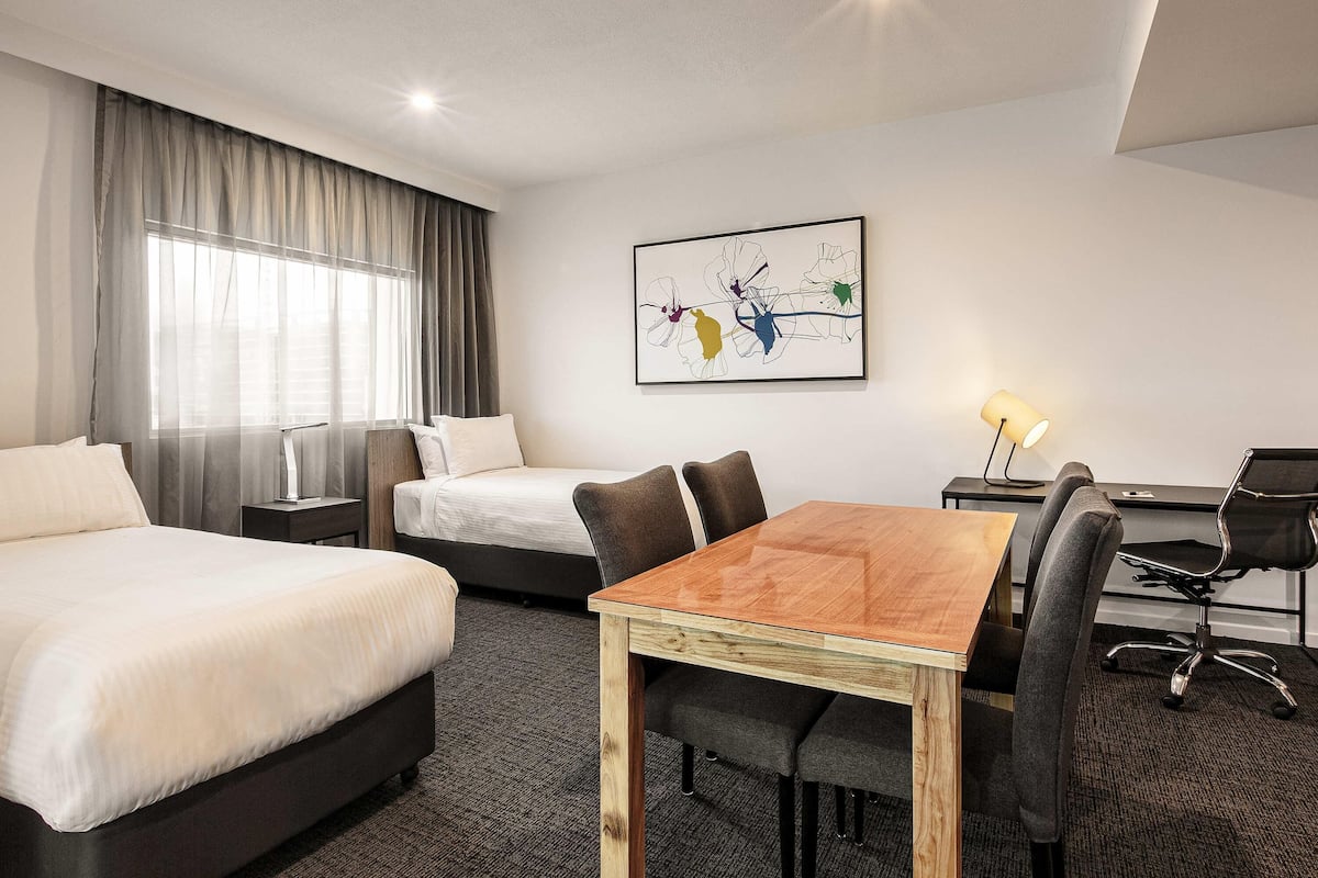 Suite familiar (Deluxe) | 1 dormitori, roba de llit d'alta qualitat i caixa forta a l'habitació