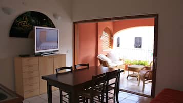 Superior Apartment, 2 Bedrooms | Living room | TV