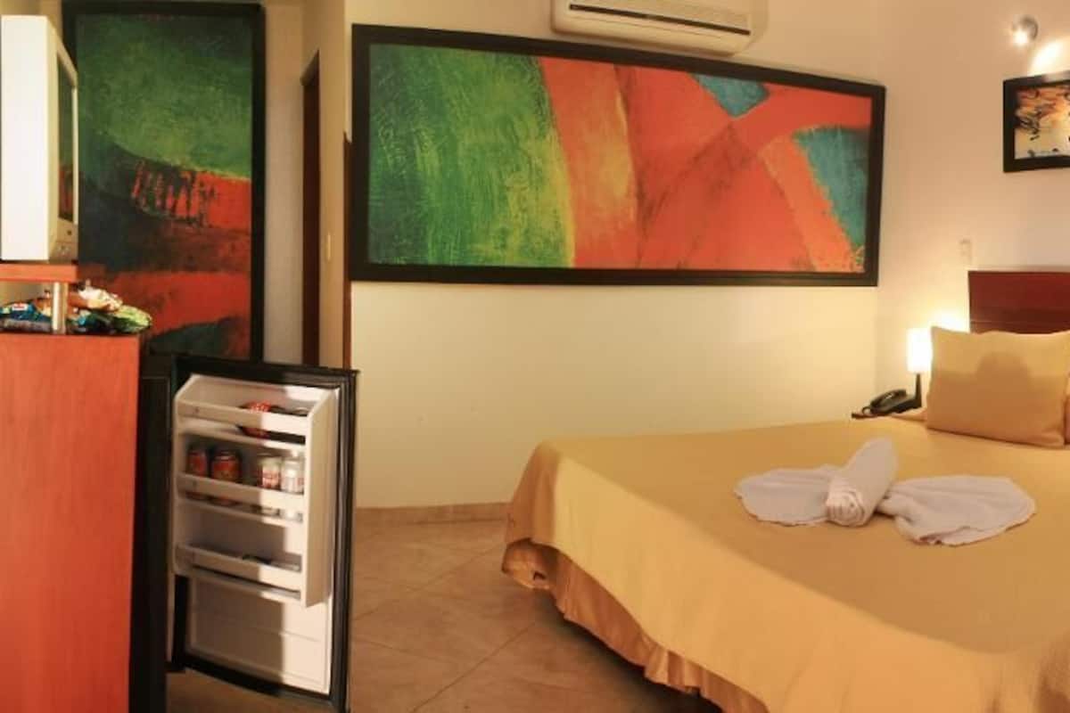 Premium bedding, minibar, blackout curtains, soundproofing
